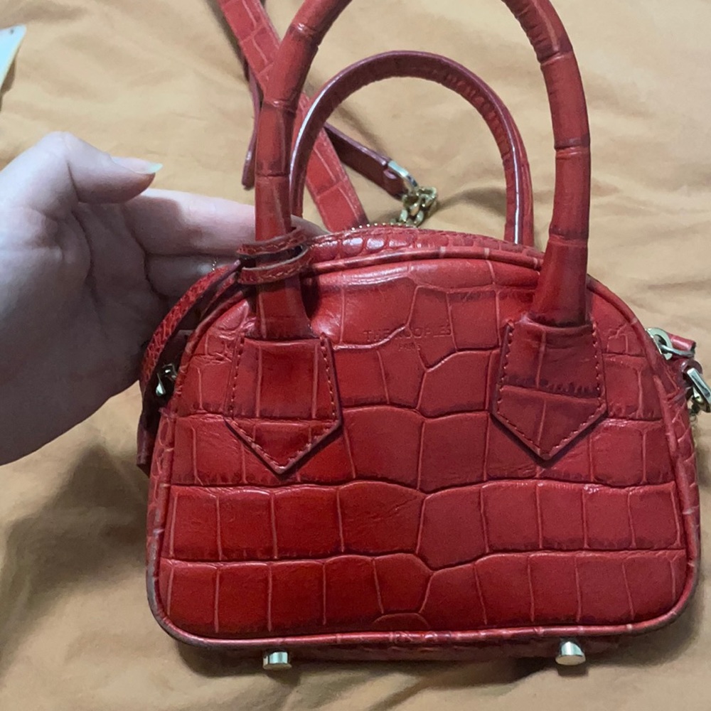 Used red kooples bag